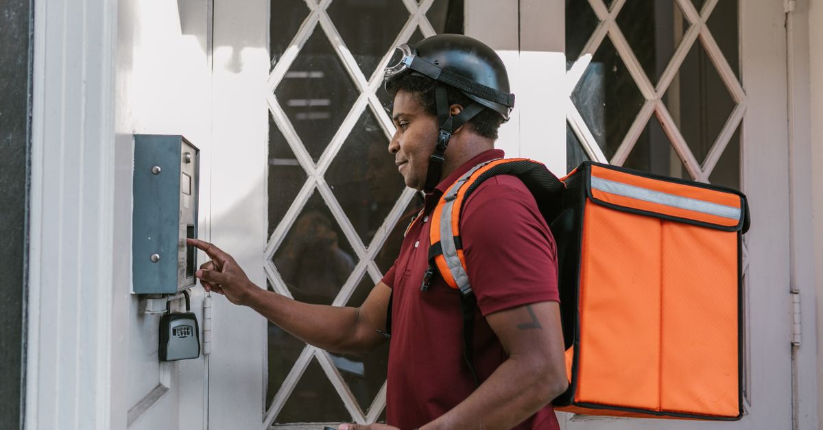 locksmith unlocking front door — 11th Ave Locksmith NYC